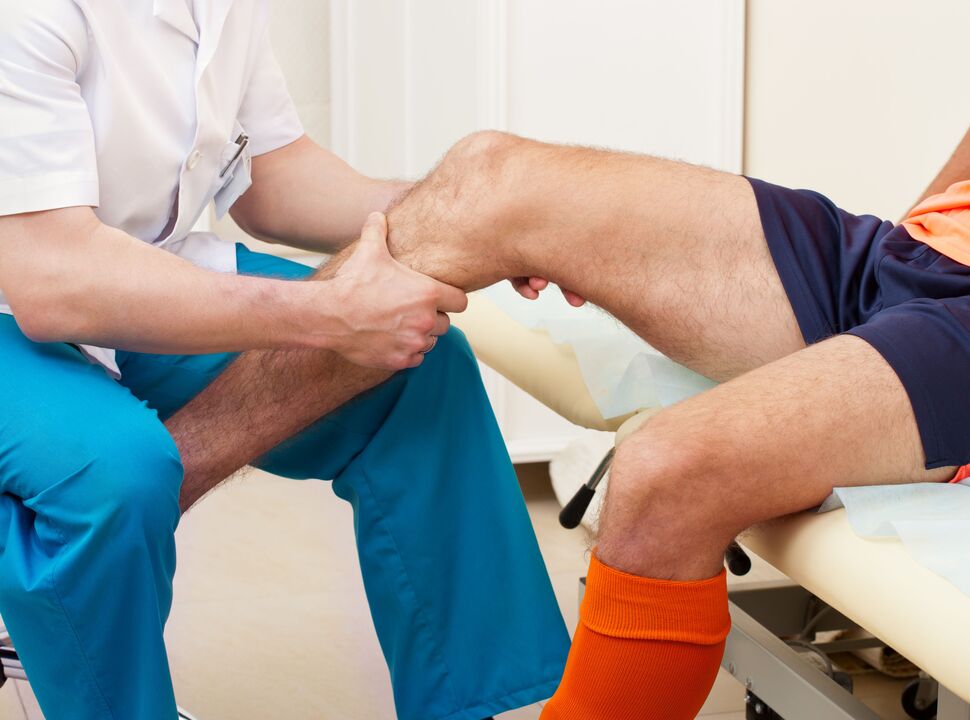 examination of the inflamed joint by a doctor